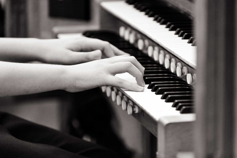 Close up of student playing piano