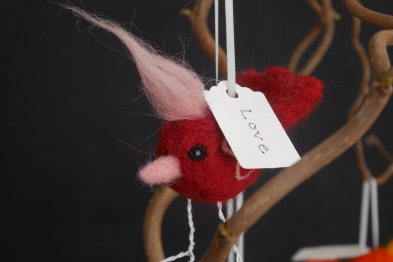 Felt bird with label love