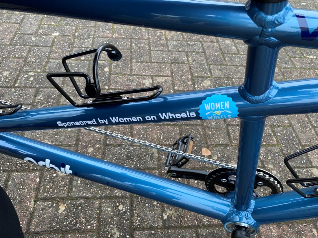 image of the bike frame with the text 'sponsored by women on wheels)