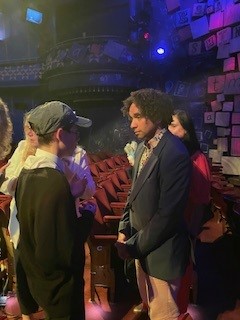 A photograph of Maxwell talking to Joseph Coelho, winner of the Carnegie medal for Writing after the ceremony.