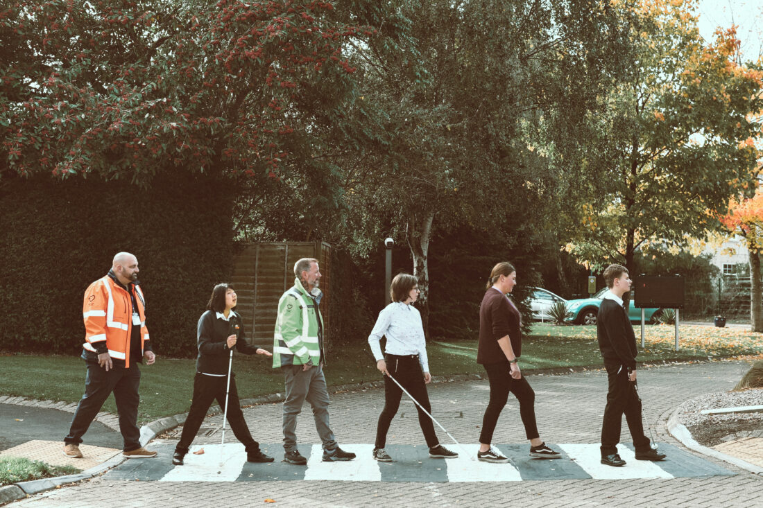 image of students and Ringway staff walking across a zebra crossing