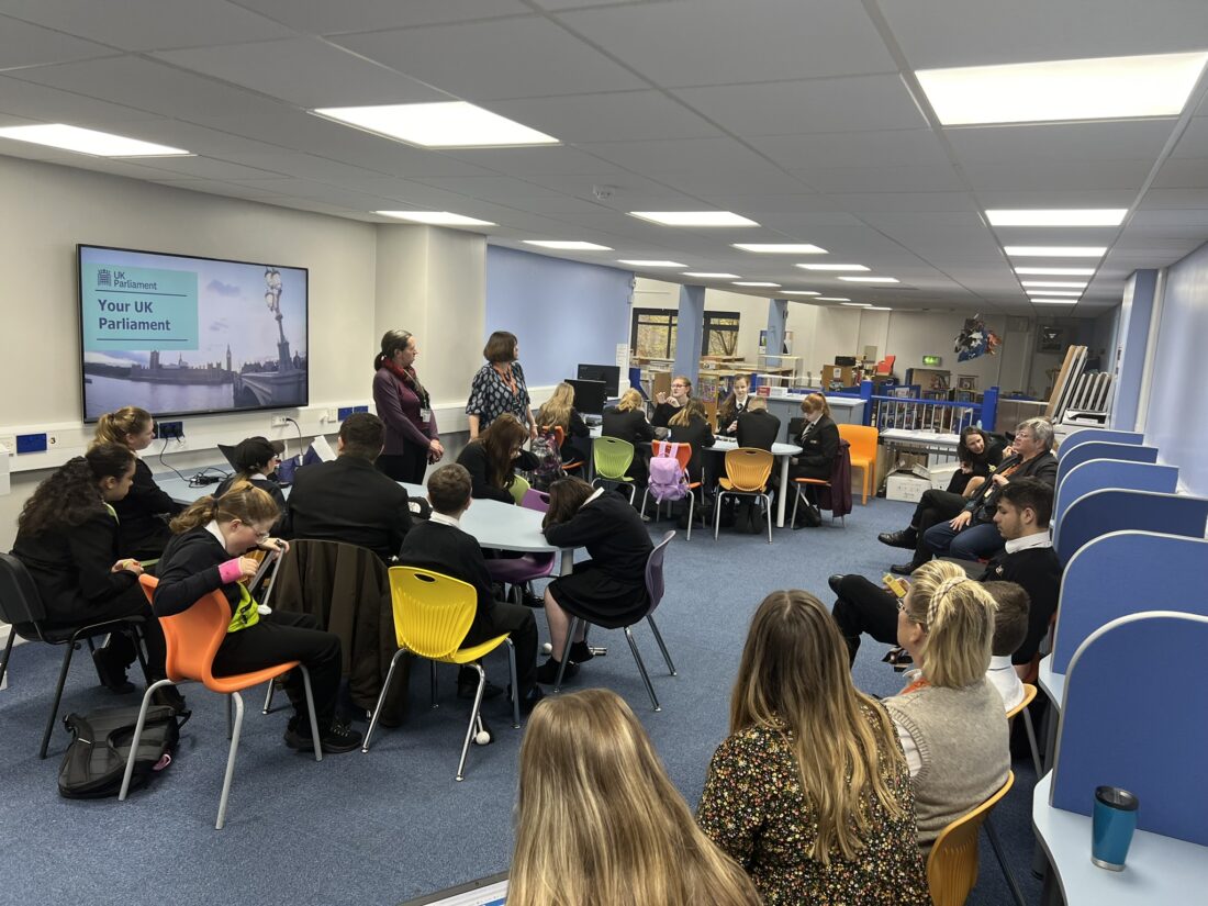 image of staff and students in the LRC listening to Clare