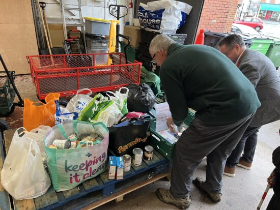 photo of staff loading the donated item