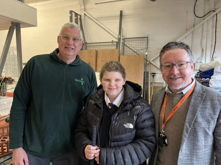 Layla at the food bank with Mr Stark and Richard